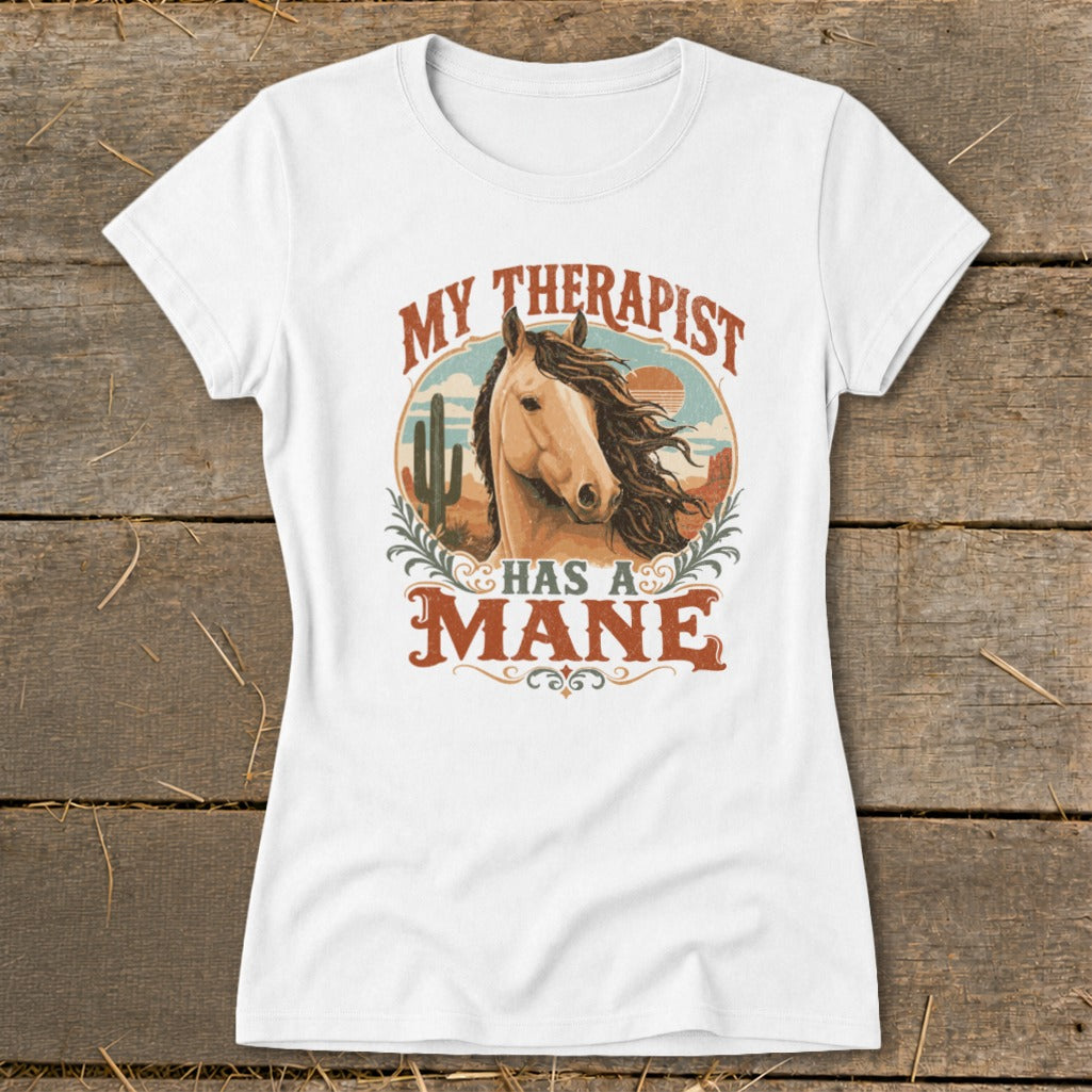 White t-shirt with a horse and desert graphic reading "My Therapist Has A Mane".