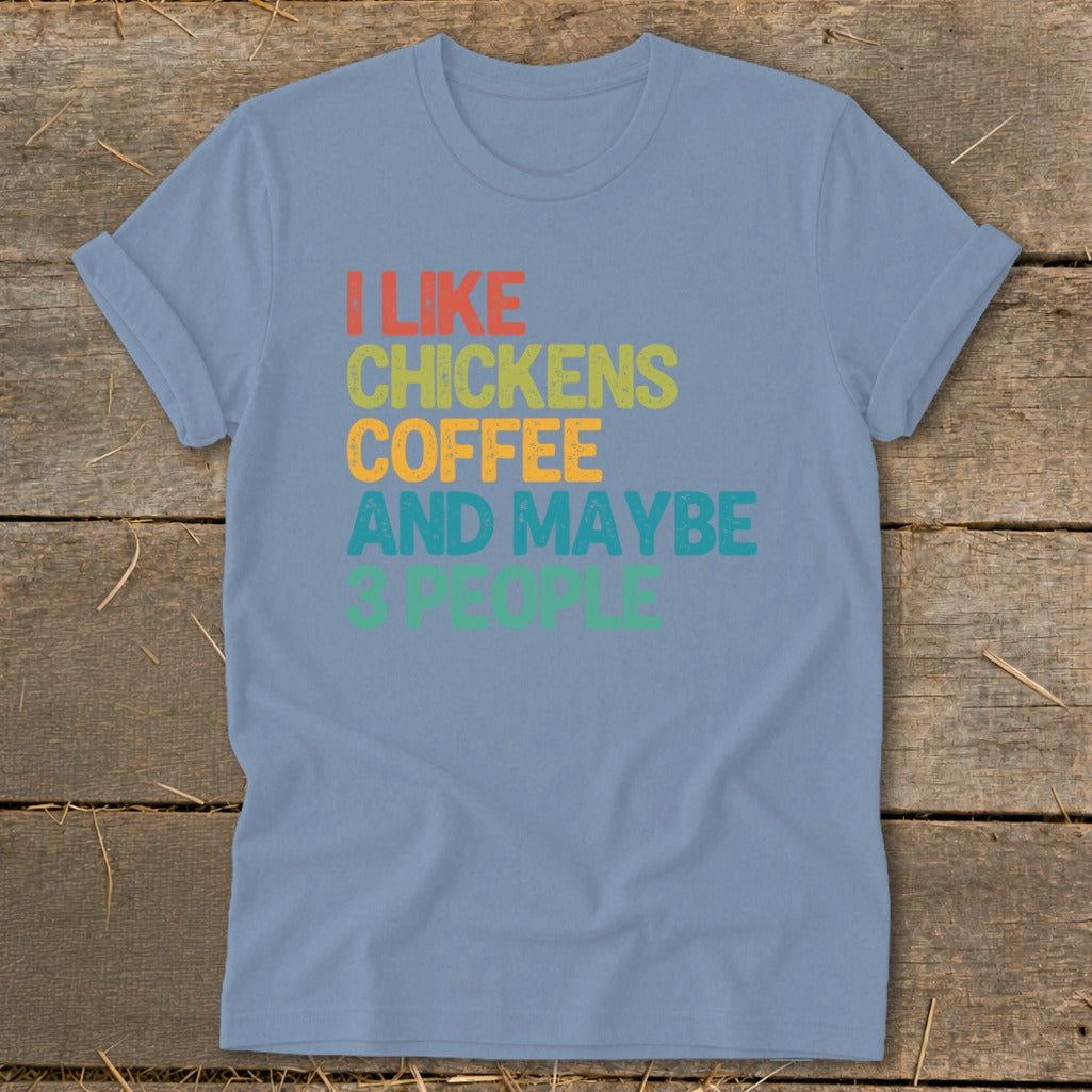 Light blue t-shirt with text: I LIKE CHICKENS COFFEE AND MAYBE 3 PEOPLE.