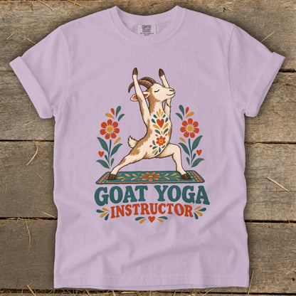 Goat doing yoga pose with "GOAT YOGA INSTRUCTOR" text and floral decorations.