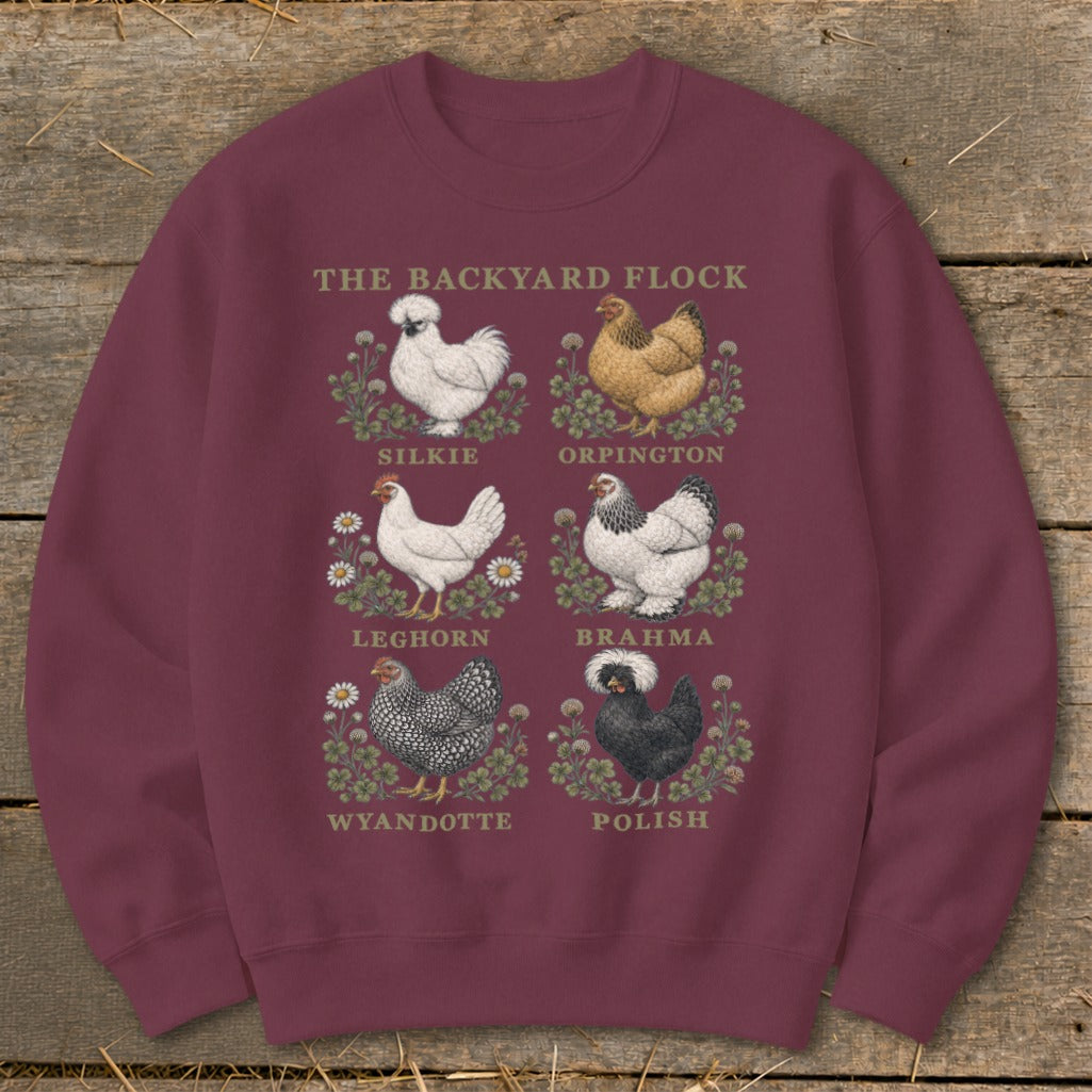 "The Backyard Flock" sweatshirt features six chicken breeds: Silkie, Orpington, Leghorn, Brahma, Wyandotte, and Polish.