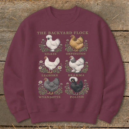 "The Backyard Flock" sweatshirt features six chicken breeds: Silkie, Orpington, Leghorn, Brahma, Wyandotte, and Polish.