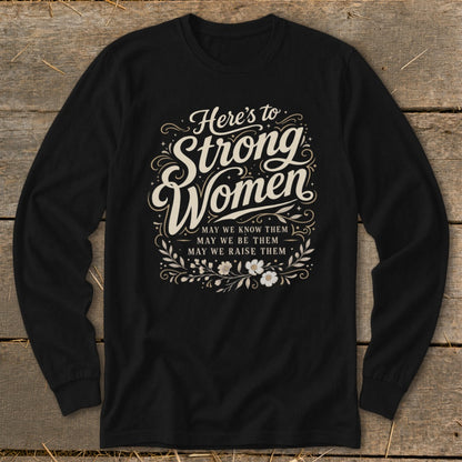 Black long-sleeve shirt with "Here's to Strong Women" text and floral design.