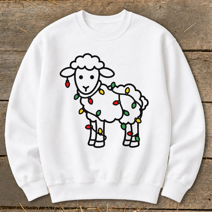 A white crewneck sweatshirt features a cartoon sheep wrapped in colorful Christmas lights.