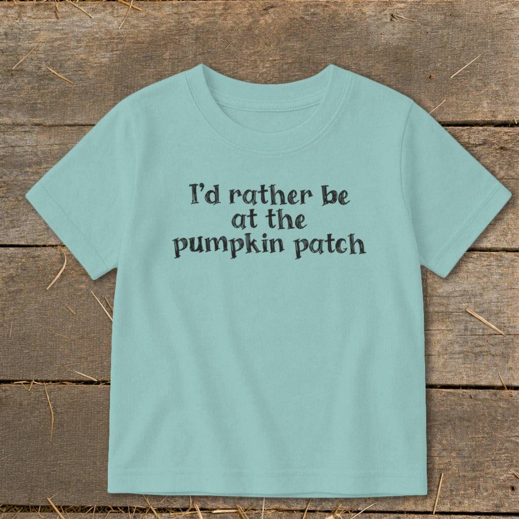Light blue t-shirt with black text reading "I'd rather be at the pumpkin patch".