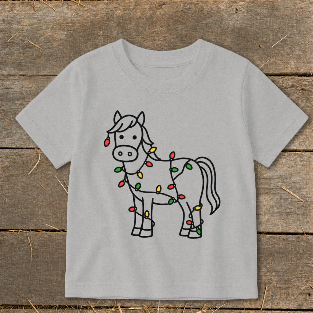 Grey t-shirt with a line art horse wrapped in colorful Christmas lights.