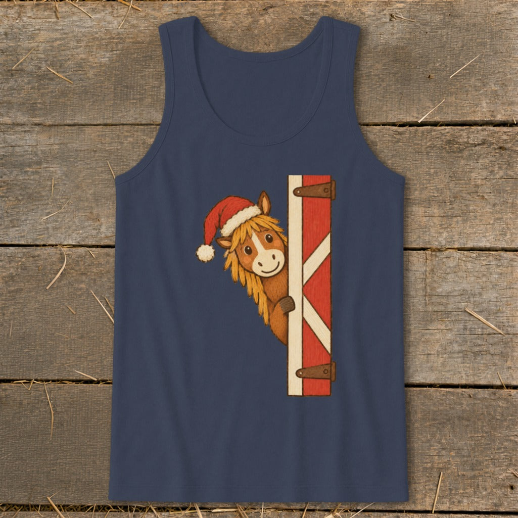 Horse wearing Santa hat peeking around a red and white barn door.