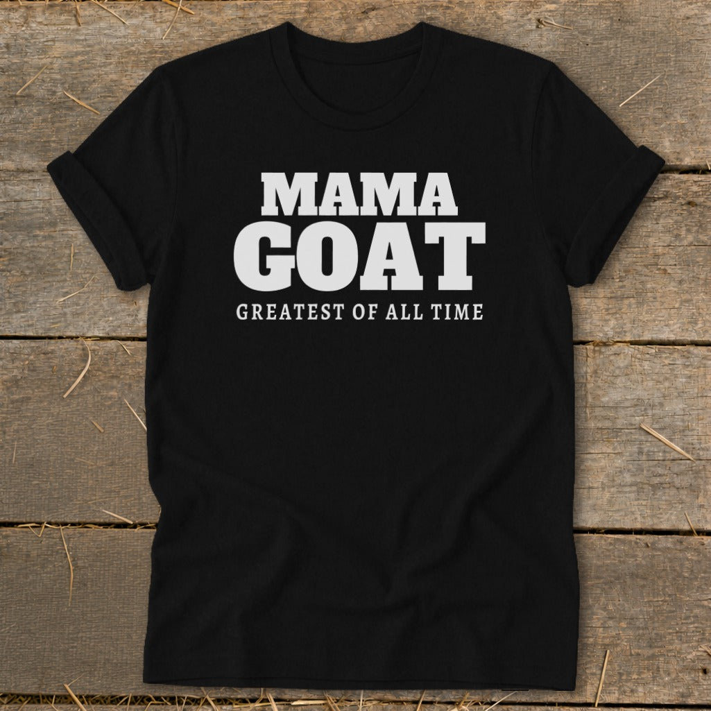 Black t-shirt with white text that reads "MAMA GOAT GREATEST OF ALL TIME".