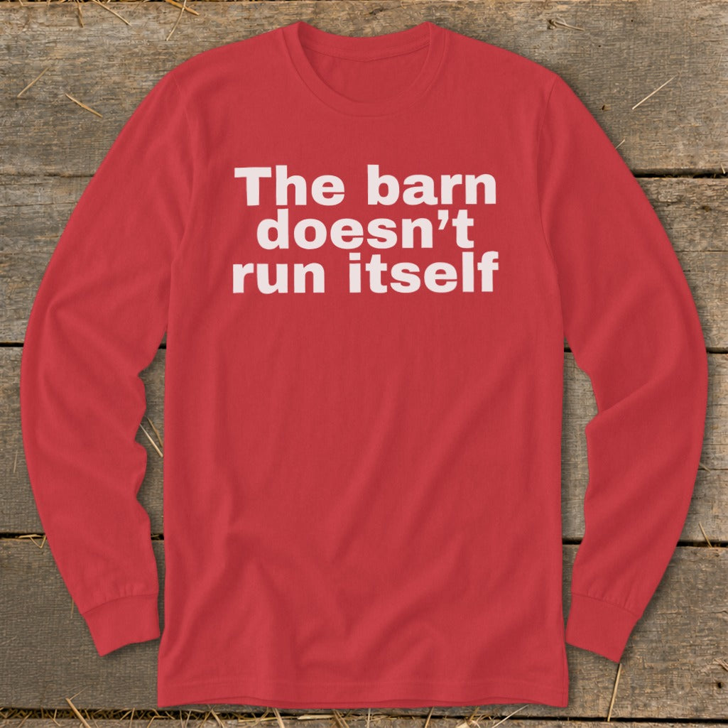 Red long sleeve shirt with white text "The barn doesn't run itself."
