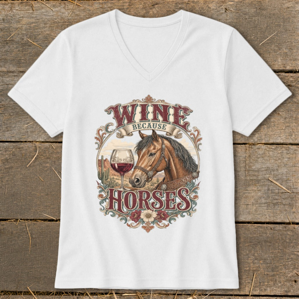 White t-shirt with "Wine Because Horses" text, horse, wine glass, and desert scenery graphic.