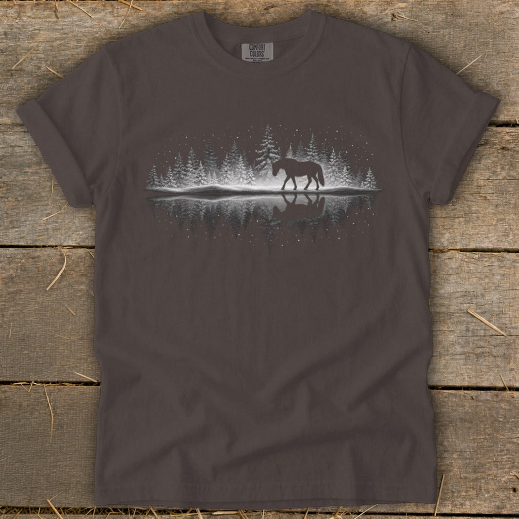 Dark t-shirt with a nighttime winter forest and horse graphic reflected in water.