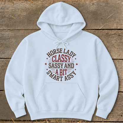 White hoodie with circular text: Horse Lady Classy Sassy and a bit Smart Ass.