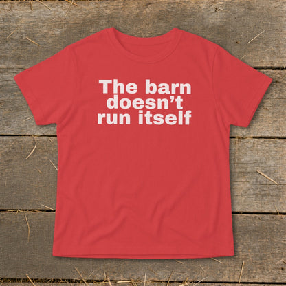 Red t-shirt with white text that reads "The barn doesn't run itself."