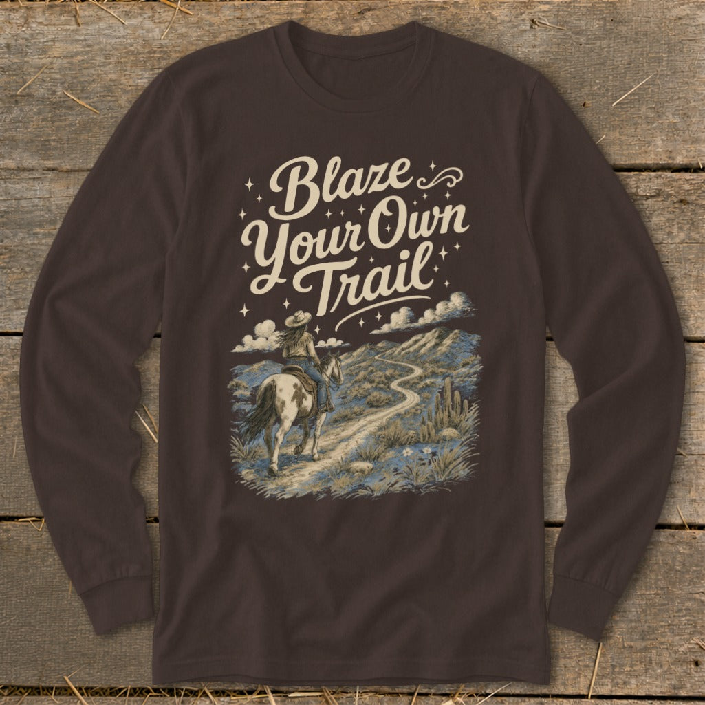 Brown long sleeve shirt with desert landscape and text "Blaze Your Own Trail."
