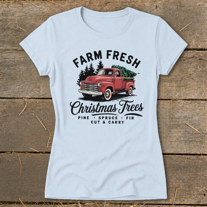 Red pickup truck with Christmas trees, text "Farm Fresh Christmas Trees".