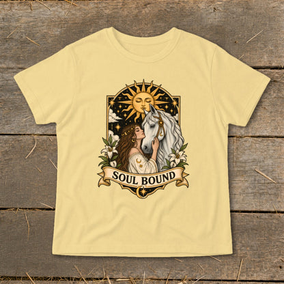 Woman embracing white horse under sun and stars with text "SOUL BOUND."