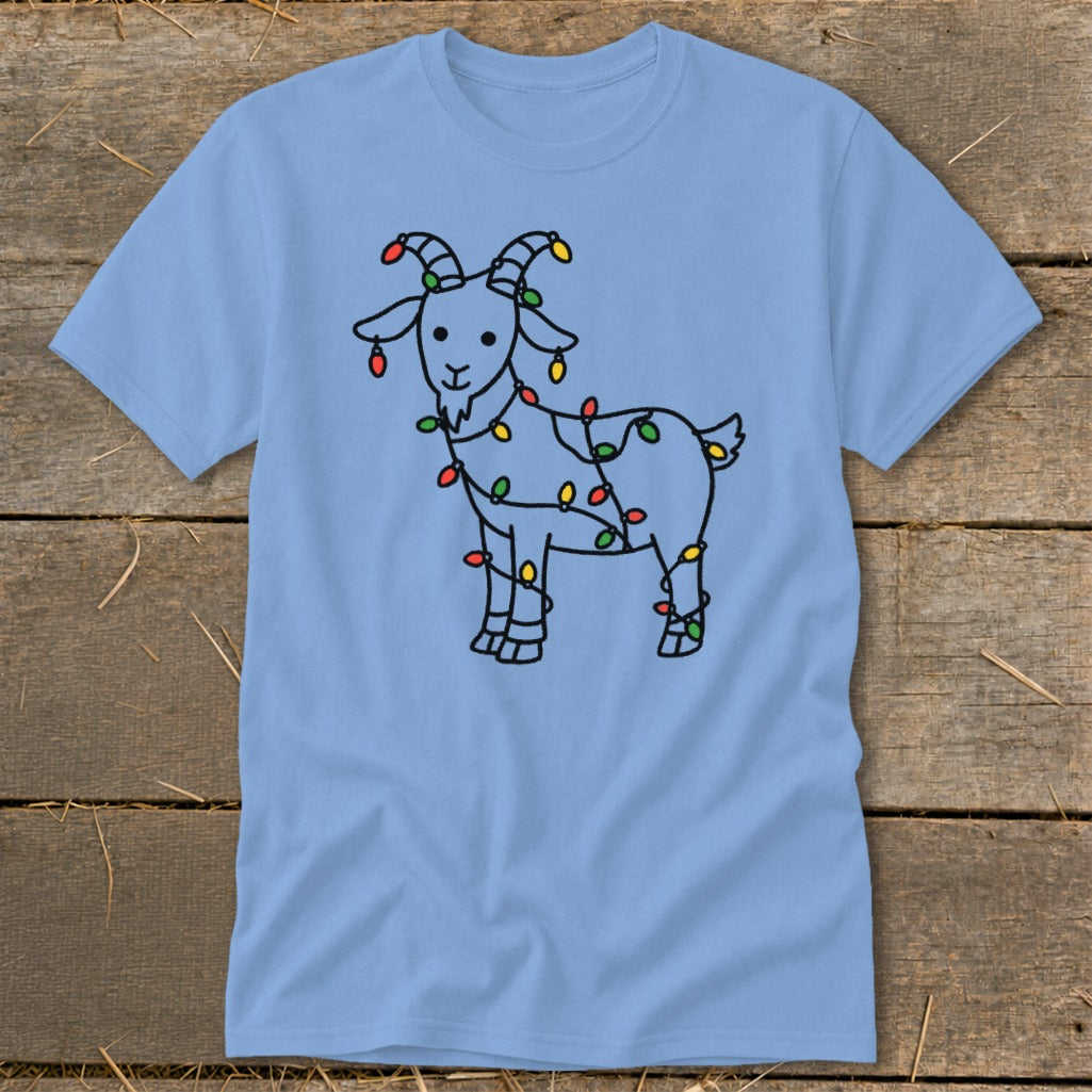 Light blue t-shirt with a line drawing of a goat wrapped in colorful Christmas lights.