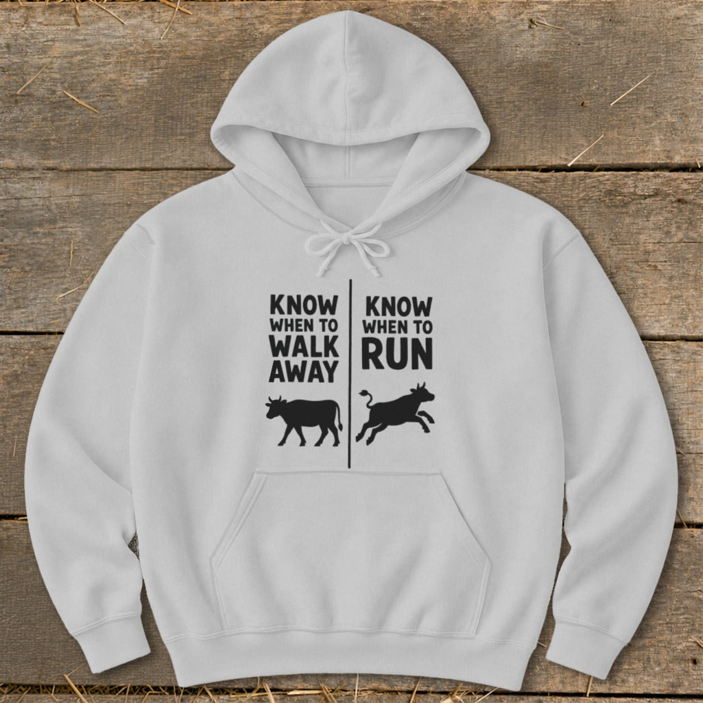 White hoodie with graphic text "Know When to Walk Away" and "Know When to Run".