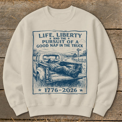 Crewneck sweatshirt with graphic "Life, Liberty and the Pursuit of a Good Nap in the Truck 1776-2026".