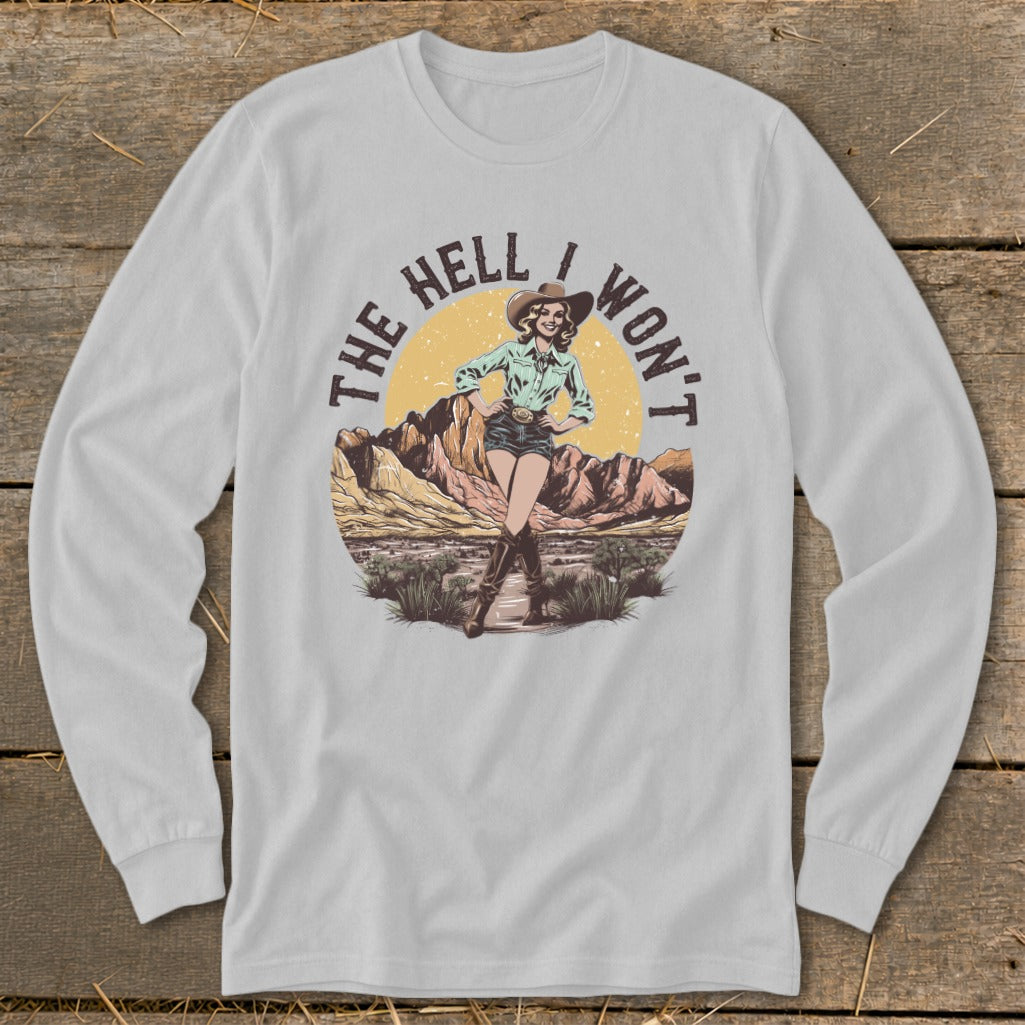 Cowgirl graphic with text "The Hell I Won't" on a desert landscape.