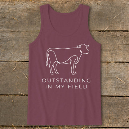 Maroon tank top with white line art cow and text "OUTSTANDING IN MY FIELD".