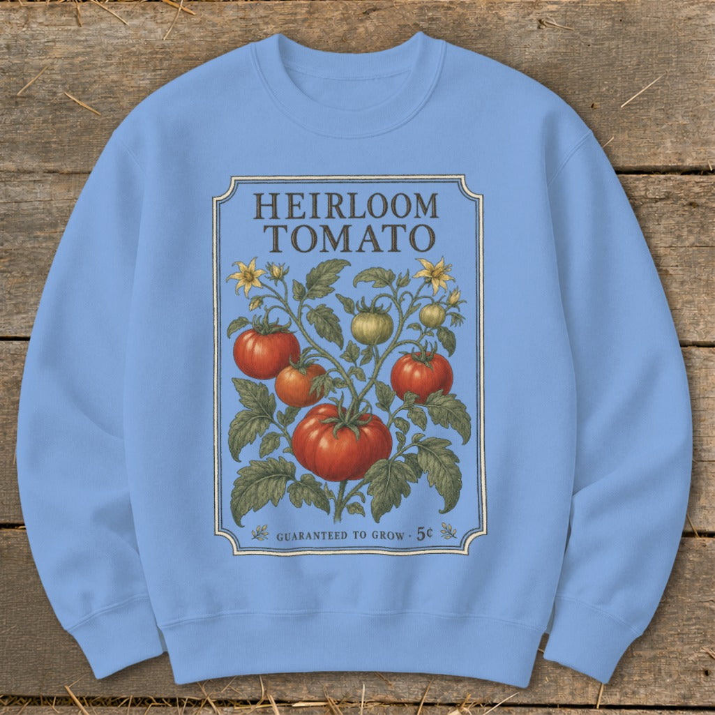 Light blue sweatshirt with heirloom tomato seed packet design.