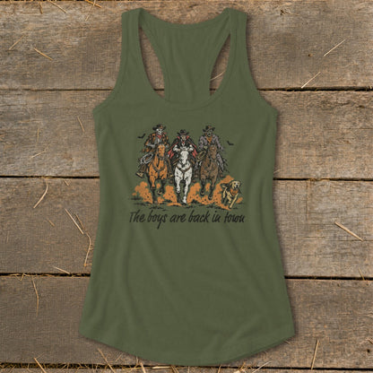Green tank top with skeletons riding horses and a dog, text "The boys are back in town".