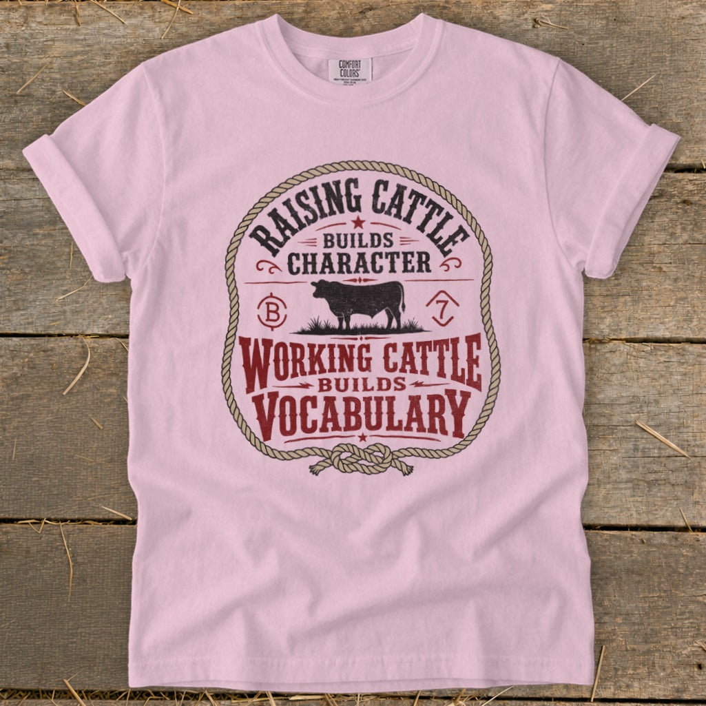 Pink t-shirt with "Raising Cattle Builds Character" and "Working Cattle Builds Vocabulary" text.