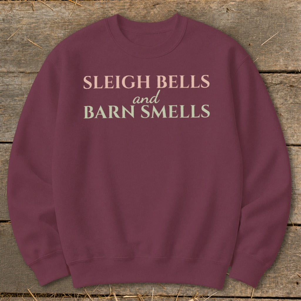 Maroon sweatshirt with "Sleigh Bells and Barn Smells" text in light pink and cream.