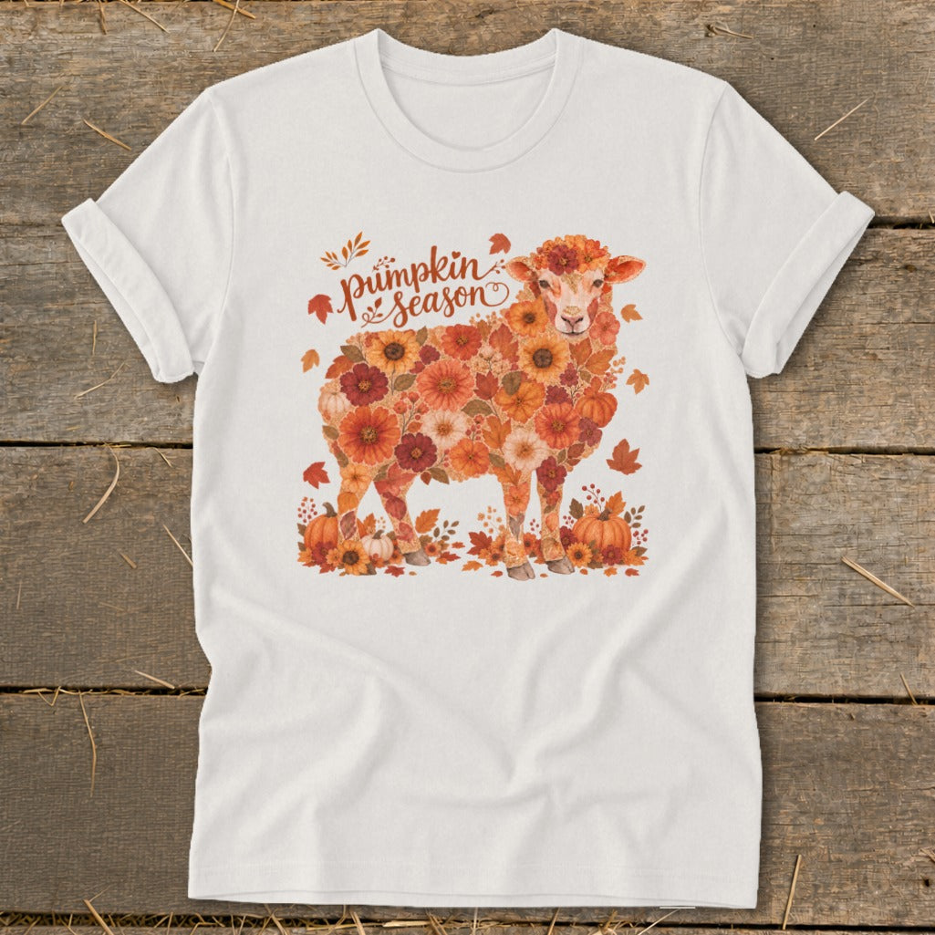 White t-shirt with floral sheep and "Pumpkin season" text.