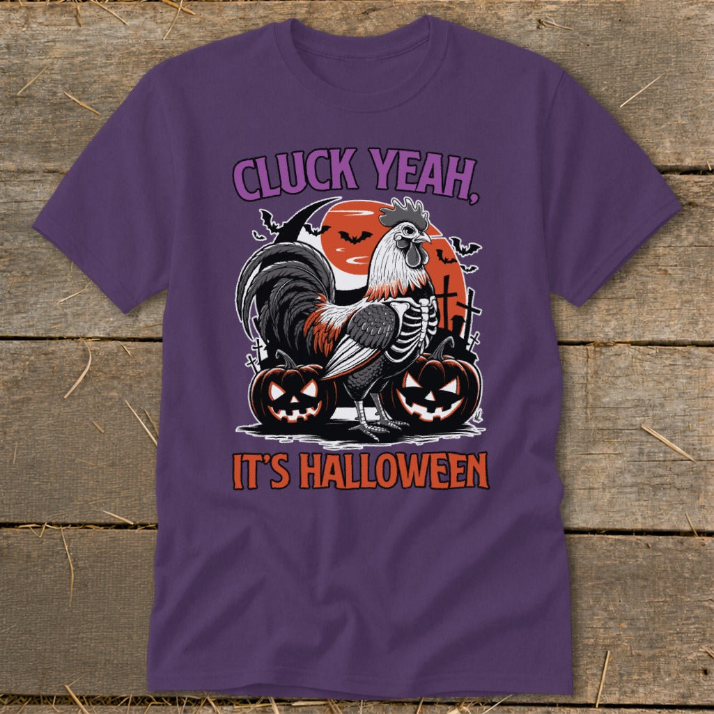 Rooster skeleton with pumpkins and bats under a moon, text "CLUCK YEAH, IT'S HALLOWEEN".