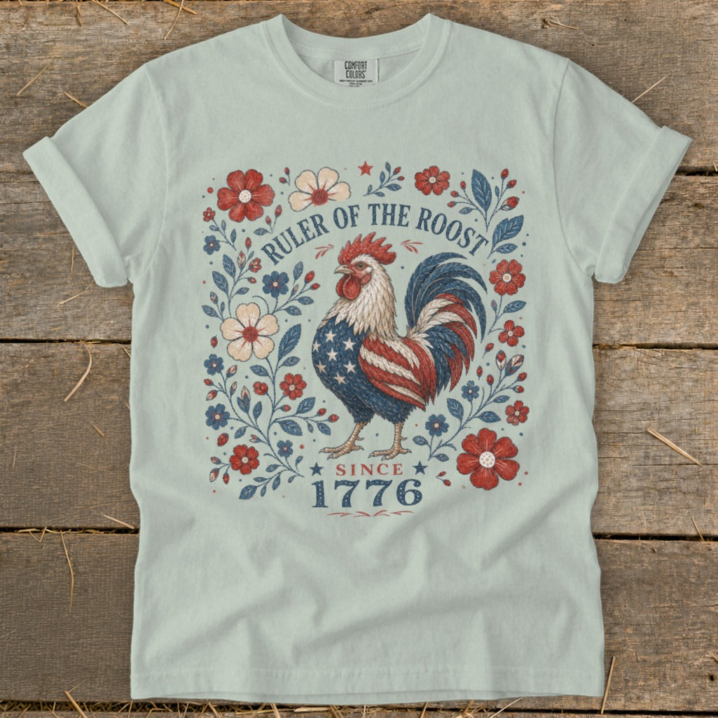 Rooster with American flag pattern, surrounded by flowers, text "RULER OF THE ROOST SINCE 1776."