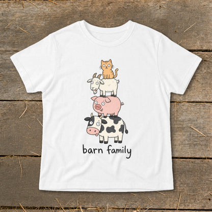 White t-shirt with cartoon cow, pig, goat, and cat stacked, text reads "barn family"