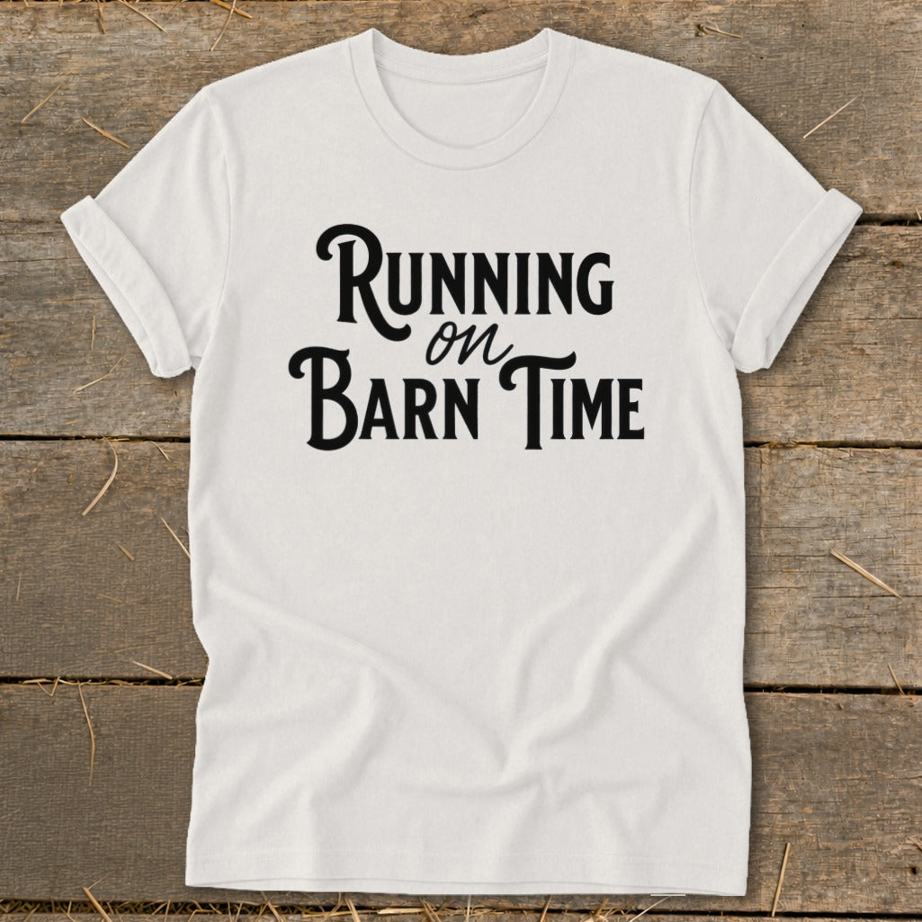 White t-shirt with black text reading "Running on Barn Time".