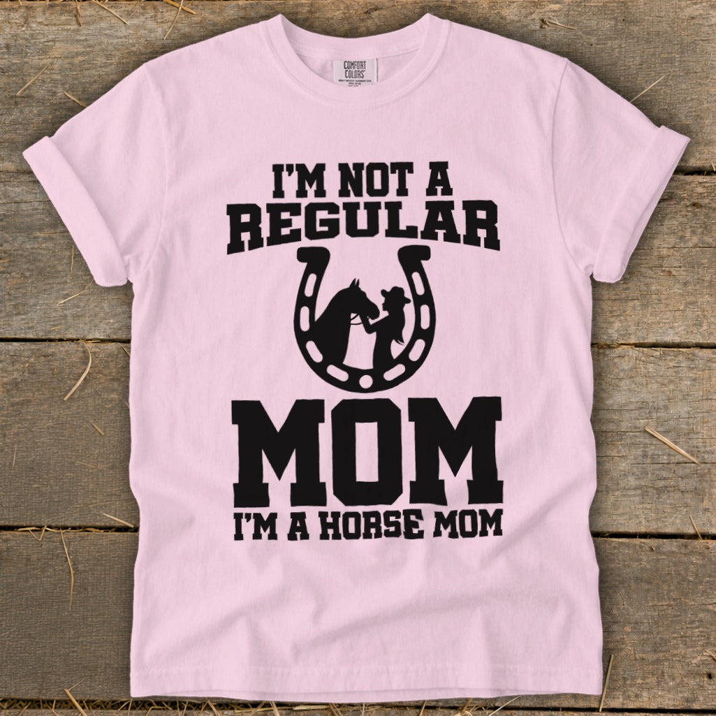 Pink t-shirt with "I'm not a regular mom, I'm a horse mom" text and horse graphic.