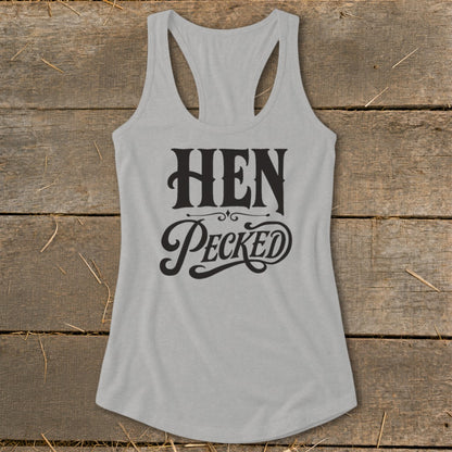 Light grey racerback tank top with "HEN Pecked" graphic design.