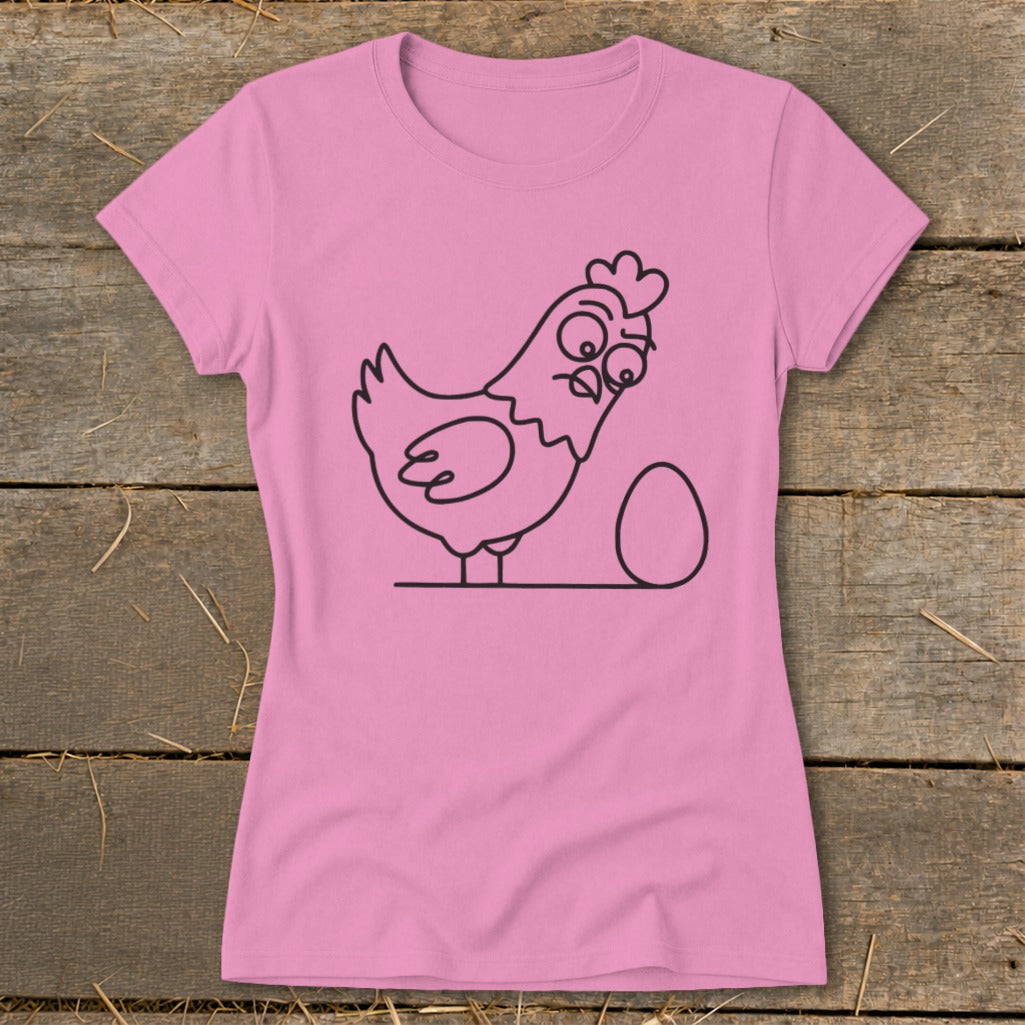 Pink t-shirt with a black line drawing of a cartoon chicken next to an egg.