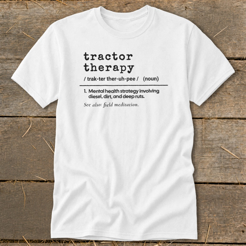 White t-shirt with "tractor therapy" definition printed on it.