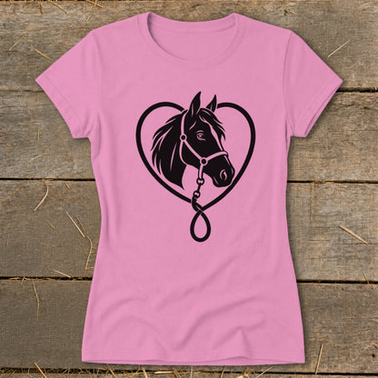 Pink short-sleeved t-shirt with a black graphic of a horse head inside a heart outline.