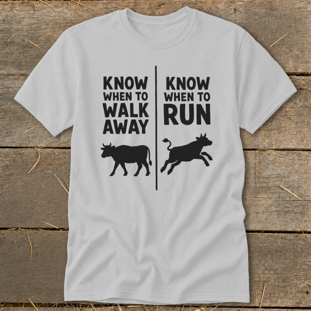 White t-shirt with black text "Know when to walk away" and "Know when to run".