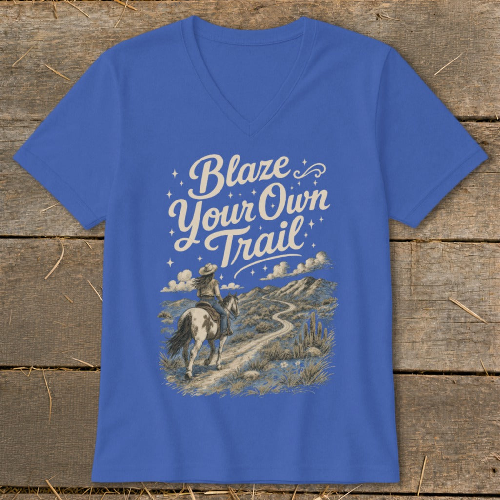 Royal blue t-shirt with "Blaze Your Own Trail" and a cowboy on horseback in a desert landscape.