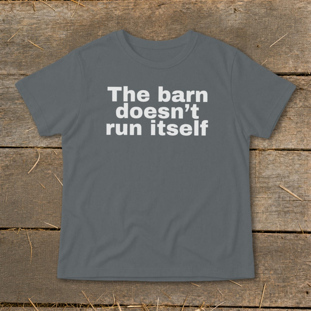 Grey t-shirt with white text reading "The barn doesn't run itself"