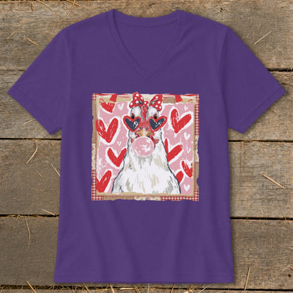 Purple t-shirt with a white chicken wearing heart sunglasses and a bow, blowing bubblegum.