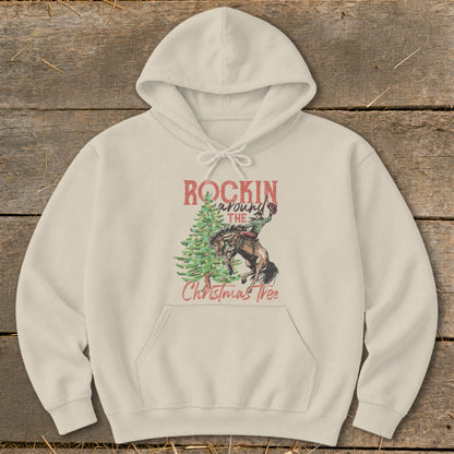 Cream hoodie with "Rockin' Around The Christmas Tree" text and rodeo graphic.