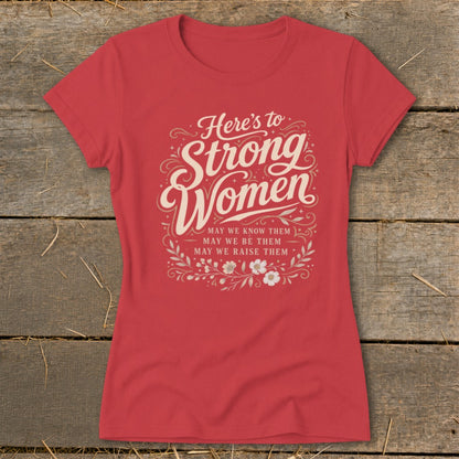 Red t-shirt with "Here's to Strong Women" and floral design.