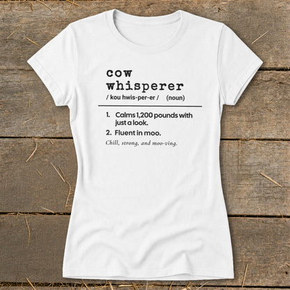 White t-shirt with "cow whisperer" definition and descriptions.