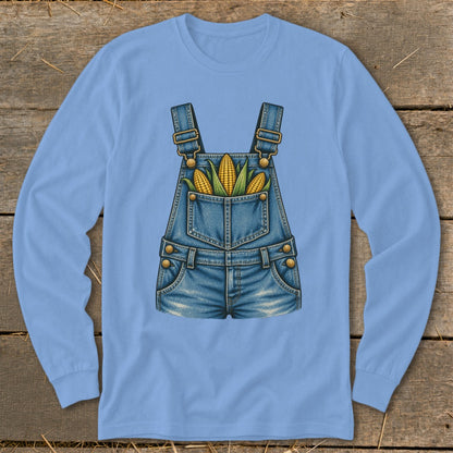 Blue long-sleeve shirt with denim overalls graphic and corn in the pocket.
