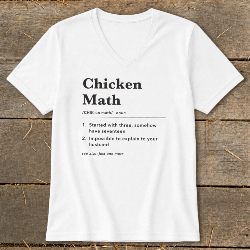 White v-neck t-shirt with "Chicken Math" definition printed in black text.