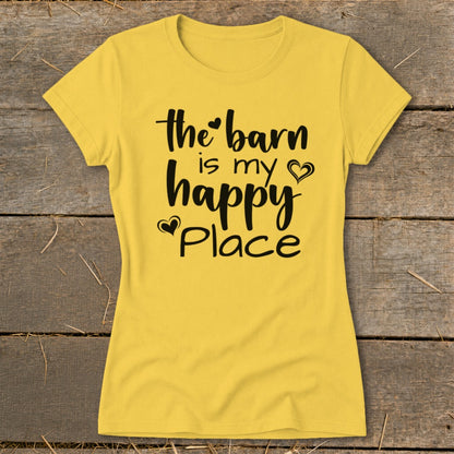Yellow t-shirt with black text that reads "the barn is my happy place".