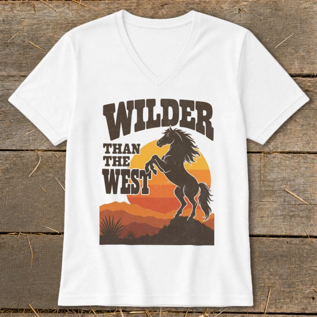 White t-shirt graphic with text "WILDER THAN THE WEST" and a rearing horse.