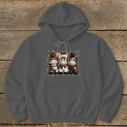 Dark grey hoodie featuring three cartoon horses in festive Christmas attire with snowflakes.